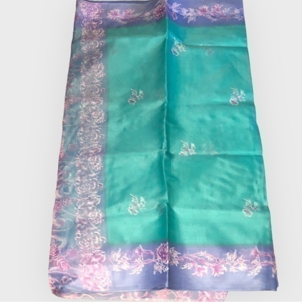 Mint Green And Lavender Colored Floral Netted Saree